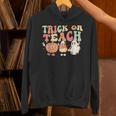 Trick Or Teach Pumpkin Candy Corn Ghost Halloween Teacher Unisex Hoodie, gift for family, gift for coworker Trick Or Teach Pumpkin Candy Corn Ghost Halloween Teacher Unisex Hoodie, gift for family, gift for coworker