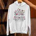 Floral Book a New Chapter Begins Retired Retirement Teacher Unisex Hoodie, gift for family, gift for coworker Floral Book a New Chapter Begins Retired Retirement Teacher Unisex Hoodie, gift for family, gift for coworker
