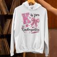 K Is For Kindergarten Teacher Coquette Bow Back To School Unisex Hoodie, gift for family, gift for coworker K Is For Kindergarten Teacher Coquette Bow Back To School Unisex Hoodie, gift for family, gift for coworker