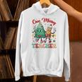 One Merry Teacher Groovy Christmas Tree Pjs Xmas Teacher Unisex Hoodie, Groovy Teacher Hoodies, gift for family, gift for coworker One Merry Teacher Groovy Christmas Tree Pjs Xmas Teacher Unisex Hoodie, Groovy Teacher Hoodies, gift for family, gift for coworker