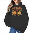 Retro Fall In Love With Learning Autumn Pumpkin Teacher Women's Hoodie, trending gift