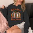 Fall In Love With Learning Book Lover Autumn Pumpkin Teacher Women's Hoodie, funny design