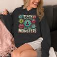I Teach The Cutest Little Monsters Teacher Halloween Outfit Women's Hoodie, funny design