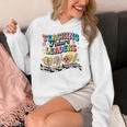 Retro Teaching Future Leaders Groovy Teacher Back To School Women's Hoodie, Future Teacher Gifts, Groovy Teacher Gifts, funny design