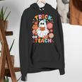 Groovy Halloween Trick Or Teach Retro Floral Ghost Teacher For Men Women Kids Women's Hoodie, Groovy Teacher Hoodies, funny gift Groovy Halloween Trick Or Teach Retro Floral Ghost Teacher For Men Women Kids Women's Hoodie, Groovy Teacher Hoodies, funny gift