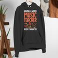 Having a Weird Music Teacher Builds Character Music Teacher Women's Hoodie, funny gift