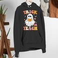 Retro Vintage Groovy Trick Or Teach Teacher Halloween For Men Women Kids Women's Hoodie, Groovy Teacher Hoodies, funny gift