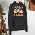 Teacher Halloween Trick Or Teach Retro Groovy Floral Ghost Women's Hoodie, Groovy Teacher Hoodies, funny gift Teacher Halloween Trick Or Teach Retro Groovy Floral Ghost Women's Hoodie, Groovy Teacher Hoodies, funny gift
