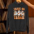 Groovy Teacher Halloween Trick Or Teach Ghost Men Women Kids Women's Hoodie, Groovy Teacher Hoodies, gift for family, gift for coworker Groovy Teacher Halloween Trick Or Teach Ghost Men Women Kids Women's Hoodie, Groovy Teacher Hoodies, gift for family, gift for coworker