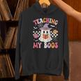 Groovy Teaching My Boos Teacher Ghost Halloween Teacher Women's Hoodie, Groovy Teacher Hoodies, gift for family, gift for coworker Groovy Teaching My Boos Teacher Ghost Halloween Teacher Women's Hoodie, Groovy Teacher Hoodies, gift for family, gift for coworker