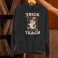 Halloween Teacher Shirts Women School Trick Or Teach Groovy Women's Hoodie, Groovy Teacher Hoodies, gift for family, gift for coworker
