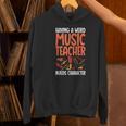 Having a Weird Music Teacher Builds Character Music Teacher Women's Hoodie, gift for family, gift for coworker
