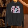 In My Pre K Era Groovy Back To School First Day Teacher Kids Women's Hoodie, Groovy Teacher Hoodies, gift for family, gift for coworker In My Pre K Era Groovy Back To School First Day Teacher Kids Women's Hoodie, Groovy Teacher Hoodies, gift for family, gift for coworker