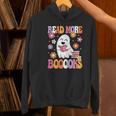 Read More Books Groovy Halloween Teacher Women Women's Hoodie, Groovy Teacher Hoodies, gift for family, gift for coworker