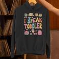 I Speak Toddler Teacher Pre-K Frist Day Back To School Women's Hoodie, gift for family, gift for coworker