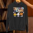 Trick Or Teach Cute Halloween Teacher Women's Hoodie, gift for family, gift for coworker