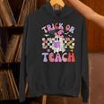 Trick Or Teach Halloween Teacher Floral Ghost Groovy Women's Hoodie, Groovy Teacher Hoodies, gift for family, gift for coworker