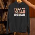 Trick Or Teach With Symbols Special Education Teacher Spooky Women's Hoodie, gift for family, gift for coworker