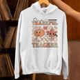 One Thankful Teacher Thanksgiving Groovy Fall Autumn Teacher Women's Hoodie, Groovy Teacher Hoodies, gift for family, gift for coworker One Thankful Teacher Thanksgiving Groovy Fall Autumn Teacher Women's Hoodie, Groovy Teacher Hoodies, gift for family, gift for coworker