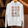 Team TK Teacher Christmas Groovy Smile Face Girl Boy Kid TK Women's Hoodie, Groovy Teacher Hoodies, gift for family, gift for coworker Team TK Teacher Christmas Groovy Smile Face Girl Boy Kid TK Women's Hoodie, Groovy Teacher Hoodies, gift for family, gift for coworker