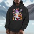 Trick Or Teach Groovy Teacher Ghost Halloween Teacher Men Hoodie, Groovy Teacher Gifts, funny design Trick Or Teach Groovy Teacher Ghost Halloween Teacher Men Hoodie, Groovy Teacher Gifts, funny design
