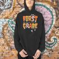 First Grade Dream Retro Team Fall Halloween Spooky Teachers Men Hoodie, First Grade Teacher Hoodies, gift for family, gift for coworker