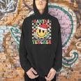 Santas Favorite Teacher Retro Groovy Smile Face Christmas Men Hoodie, Groovy Teacher Hoodies, gift for family, gift for coworker Santas Favorite Teacher Retro Groovy Smile Face Christmas Men Hoodie, Groovy Teacher Hoodies, gift for family, gift for coworker