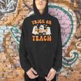 Teacher Halloween Trick Or Teach Retro Groovy Floral Ghost Men Hoodie, Groovy Teacher Hoodies, gift for family, gift for coworker Teacher Halloween Trick Or Teach Retro Groovy Floral Ghost Men Hoodie, Groovy Teacher Hoodies, gift for family, gift for coworker