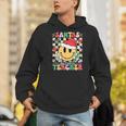Santas Favorite Teacher Retro Groovy Smile Face Christmas Men Hoodie, Groovy Teacher Hoodies, funny gift Santas Favorite Teacher Retro Groovy Smile Face Christmas Men Hoodie, Groovy Teacher Hoodies, funny gift