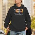 Toddler Teacher Retro Groovy Women Happy First Day Of School Men Hoodie, Groovy Teacher Hoodies, funny gift Toddler Teacher Retro Groovy Women Happy First Day Of School Men Hoodie, Groovy Teacher Hoodies, funny gift