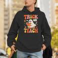 Trick Or Teach Halloween Shirt For Teacher Kids Floral Ghost Men Hoodie, funny gift Trick Or Teach Halloween Shirt For Teacher Kids Floral Ghost Men Hoodie, funny gift