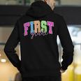 Back To School Neon Checkered First Grade Colorful Teacher Men's Hoodie Back Print, First Grade Teacher Hoodies, funny gift