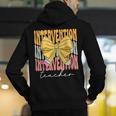 Interventionist Teacher Groovy Coquette Bow Back To School Men's Hoodie Back Print, Groovy Teacher Hoodies, funny gift