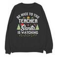 Christmas Be Nice To The Teacher Santa Is Watching Xmas Unisex Sweatshirt, trending gift Christmas Be Nice To The Teacher Santa Is Watching Xmas Unisex Sweatshirt, trending gift