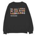 ESL Teacher We All Laugh In The Same Language Unisex Sweatshirt, Esl Teacher Gifts, trending gift ESL Teacher We All Laugh In The Same Language Unisex Sweatshirt, Esl Teacher Gifts, trending gift