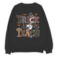 Fall Holiday Themed Thanksgiving Halloween Teacher Trick Or Unisex Sweatshirt, trending gift Fall Holiday Themed Thanksgiving Halloween Teacher Trick Or Unisex Sweatshirt, trending gift