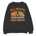 Fall In Love With Learning Autumn Pumpkin Fall Teacher Kids Unisex Sweatshirt, trending gift Fall In Love With Learning Autumn Pumpkin Fall Teacher Kids Unisex Sweatshirt, trending gift