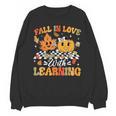 Fall In Love With Learning Fall Teacher Thanksgiving Retro Unisex Sweatshirt, trending gift Fall In Love With Learning Fall Teacher Thanksgiving Retro Unisex Sweatshirt, trending gift