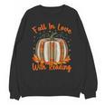 Fall In Love With Reading Pumpkin Autumn Librarians Teacher Unisex Sweatshirt, trending gift Fall In Love With Reading Pumpkin Autumn Librarians Teacher Unisex Sweatshirt, trending gift