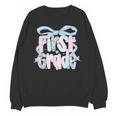 First Grade Coquette Bow Girls Teacher Team 1st Grade Squad Unisex Sweatshirt, First Grade Teacher Gifts, trending gift