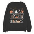 Halloween Library Ghost Books Teacher Spooky Trick Or Teach Unisex Sweatshirt, trending gift Halloween Library Ghost Books Teacher Spooky Trick Or Teach Unisex Sweatshirt, trending gift