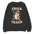 Halloween Teacher Shirts Women School Trick Or Teach Groovy Unisex Sweatshirt, Groovy Teacher Gifts, trending gift Halloween Teacher Shirts Women School Trick Or Teach Groovy Unisex Sweatshirt, Groovy Teacher Gifts, trending gift