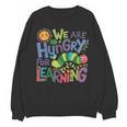We Are Hungry For Learning Teacher Life Back To School Unisex Sweatshirt, trending gift We Are Hungry For Learning Teacher Life Back To School Unisex Sweatshirt, trending gift
