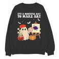 It's A Bootiful Day To Make Art Groovy Art Teacher Halloween Unisex Sweatshirt, Groovy Teacher Gifts, trending gift It's A Bootiful Day To Make Art Groovy Art Teacher Halloween Unisex Sweatshirt, Groovy Teacher Gifts, trending gift