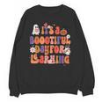 It's A Bootiful Day For Learning Cute Teacher Halloween Unisex Sweatshirt, trending gift It's A Bootiful Day For Learning Cute Teacher Halloween Unisex Sweatshirt, trending gift