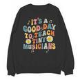 Its A Good Day To Teach Tiny Musicians Music Teacher Flower Unisex Sweatshirt, trending gift