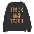 Leopard Trick Or Teach Halloween Teacher Costume Women Unisex Sweatshirt, trending gift Leopard Trick Or Teach Halloween Teacher Costume Women Unisex Sweatshirt, trending gift