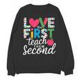 Love Them First Teach Them Second Teacher Student Love Quote Unisex Sweatshirt, trending gift Love Them First Teach Them Second Teacher Student Love Quote Unisex Sweatshirt, trending gift
