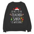 Be Nice Teacher Santa Watching Xmas School Students For Men Women Unisex Sweatshirt, trending gift