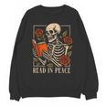 Read In Peace Skeleton Reading Book Halloween Teacher Unisex Sweatshirt, trending gift Read In Peace Skeleton Reading Book Halloween Teacher Unisex Sweatshirt, trending gift